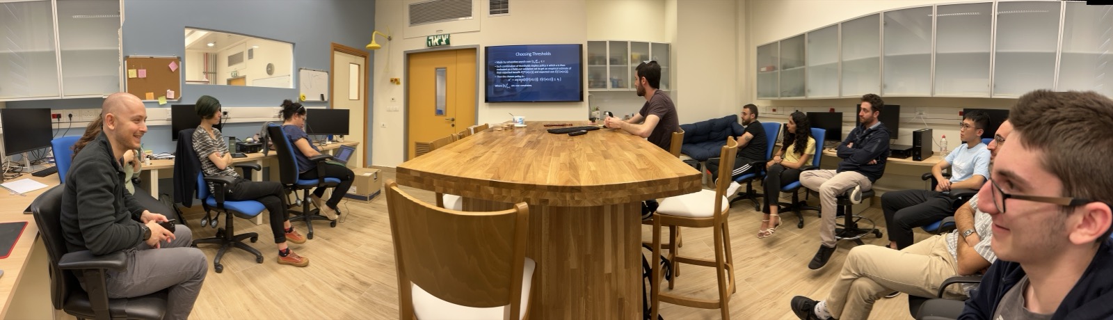 Lab meeting with team around the island